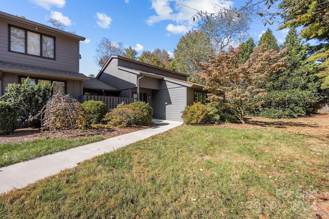 view of front of home with a front yard