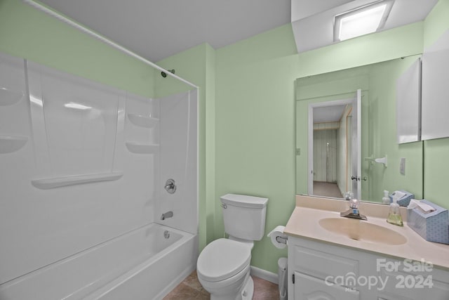 full bathroom featuring vanity, bathing tub / shower combination, toilet, and tile patterned flooring