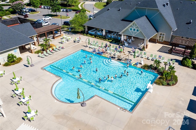 view of swimming pool featuring a patio