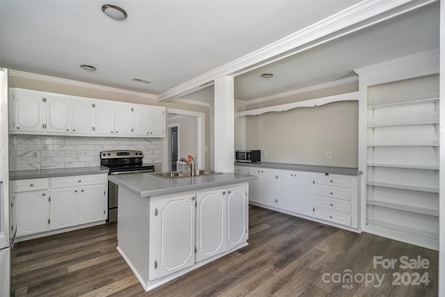 kitchen featuring appliances with stainless steel finishes, white cabinetry, a center island with sink, and dark hardwood / wood-style flooring