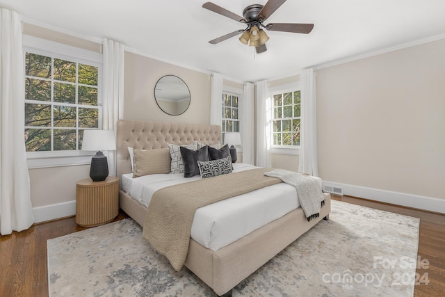 bedroom with hardwood / wood-style flooring and ceiling fan