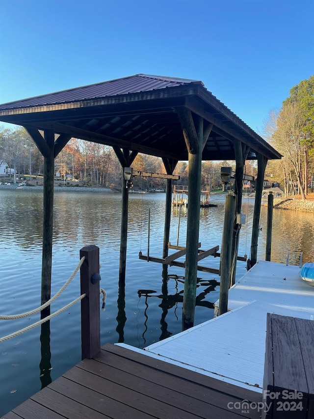 view of dock with a water view