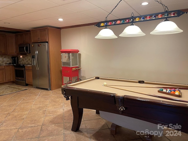 playroom featuring light tile patterned floors, crown molding, and billiards