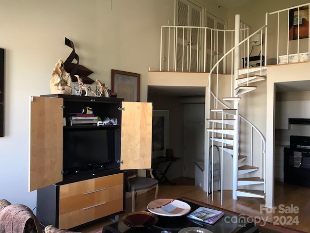 living room with dark hardwood / wood-style floors