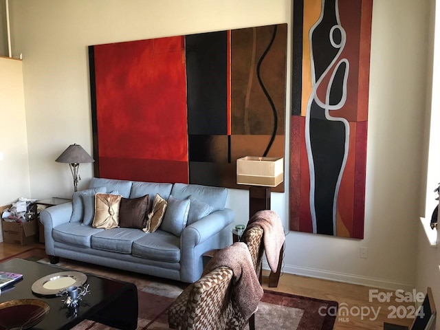 living room with wood-type flooring