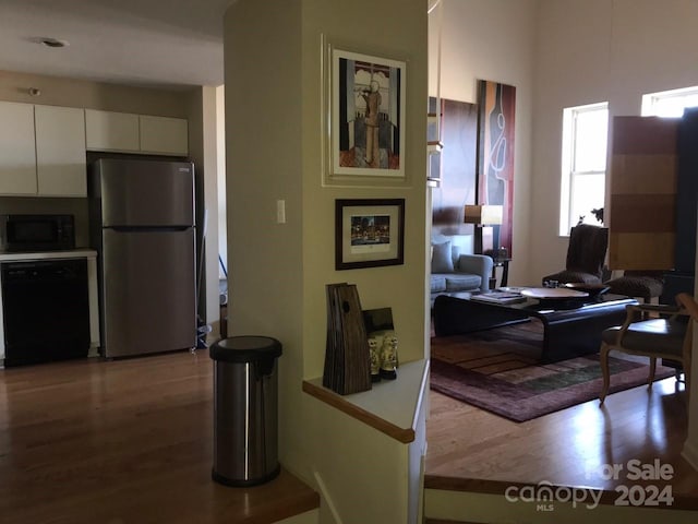 interior space with hardwood / wood-style floors