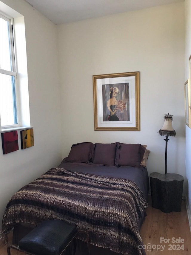 bedroom featuring hardwood / wood-style floors