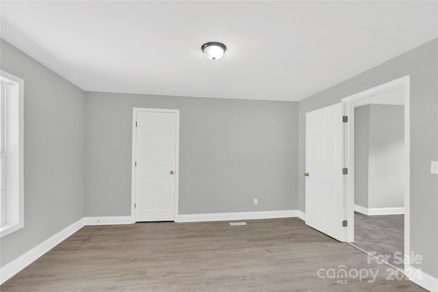 empty room featuring light hardwood / wood-style floors