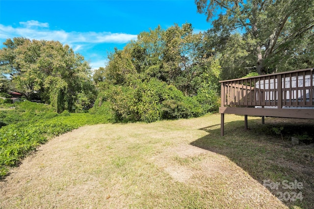 view of yard featuring a deck