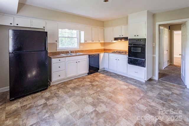 kitchen featuring under cabinet range hood, black appliances, white cabinetry, a sink, and a warming drawer