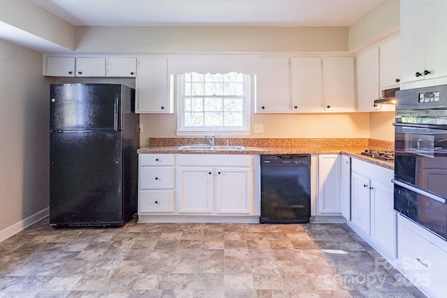 kitchen with white cabinetry, a sink, under cabinet range hood, and black appliances