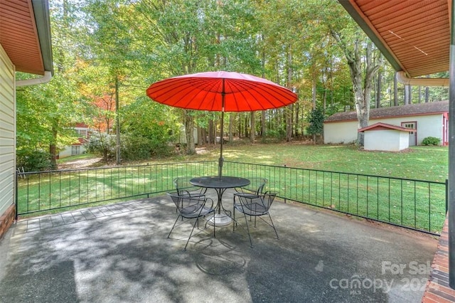 view of patio / terrace with a storage unit