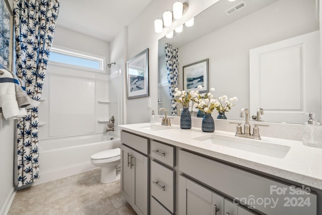 full bathroom featuring vanity, shower / tub combo, toilet, and tile patterned floors