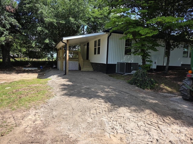 7608 Kershaw Camden Hwy, Kershaw, SC 29067 - manufactured / mobile home with central air condition unit and dirt driveway
