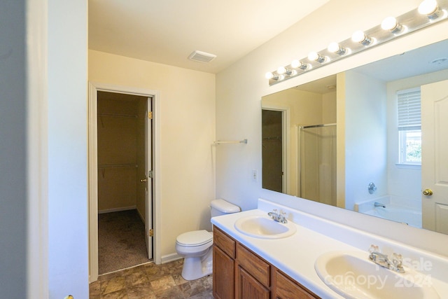 full bathroom with independent shower and bath, vanity, and toilet