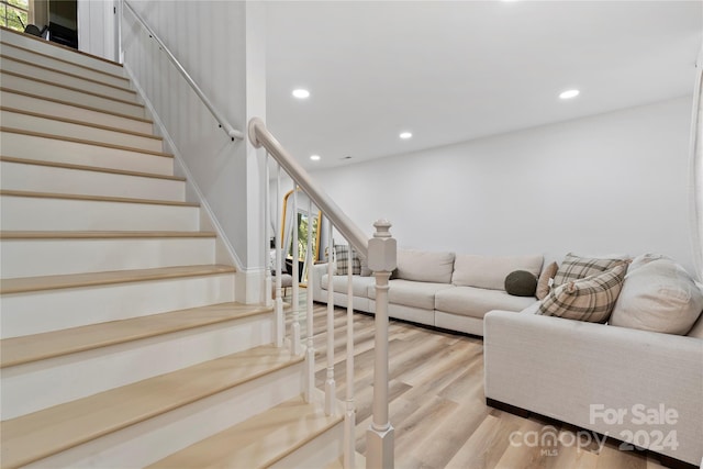 living room featuring light hardwood / wood-style floors and plenty of natural light