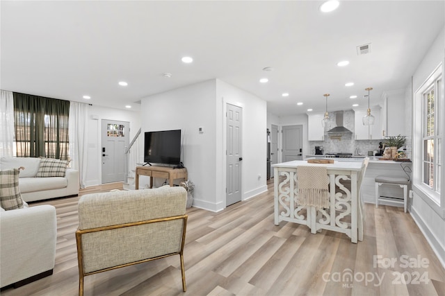 living room featuring light hardwood / wood-style floors