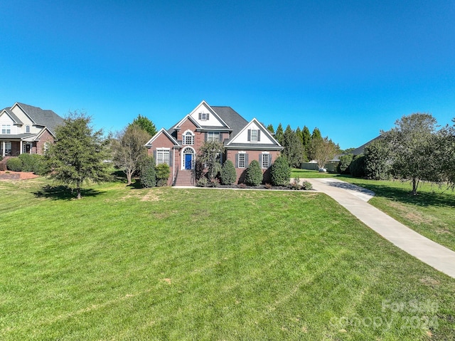 view of front of home with a front lawn