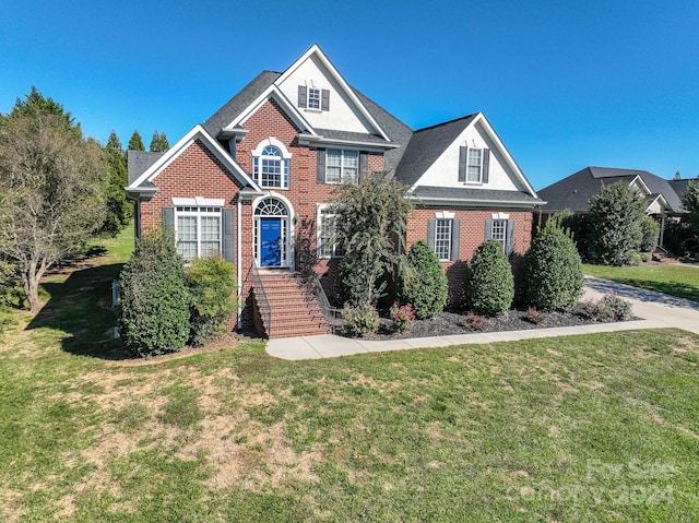 view of front facade featuring a front yard