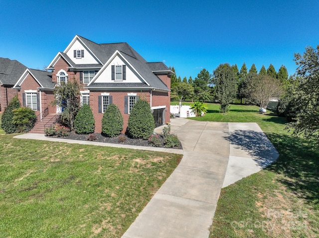 view of front facade featuring a front yard and a garage