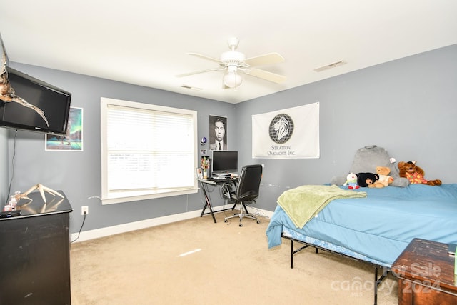 carpeted bedroom with ceiling fan