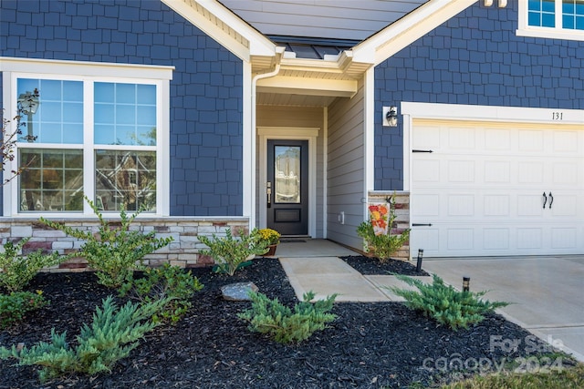 entrance to property with a garage