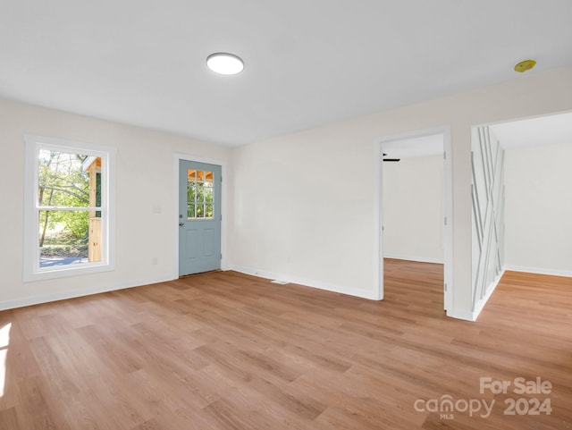 empty room featuring light hardwood / wood-style floors