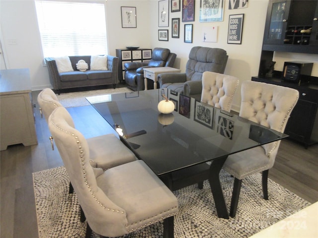 dining area with wood-type flooring