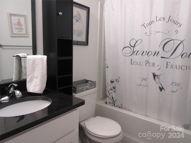 full bathroom featuring vanity, toilet, and shower / bathtub combination with curtain