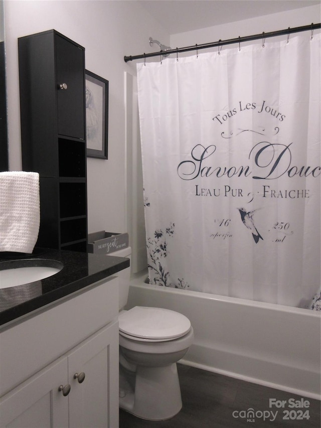 full bathroom with vanity, toilet, and shower / bathtub combination with curtain