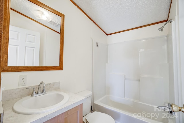 full bathroom featuring toilet, a textured ceiling, vanity, and shower / bathtub combination