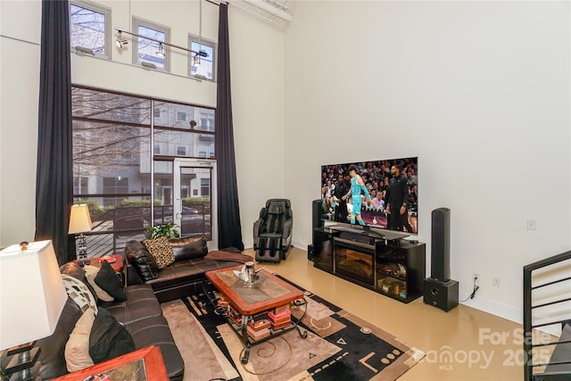 living room with a high ceiling