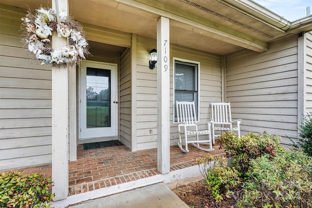 entrance to property with a porch