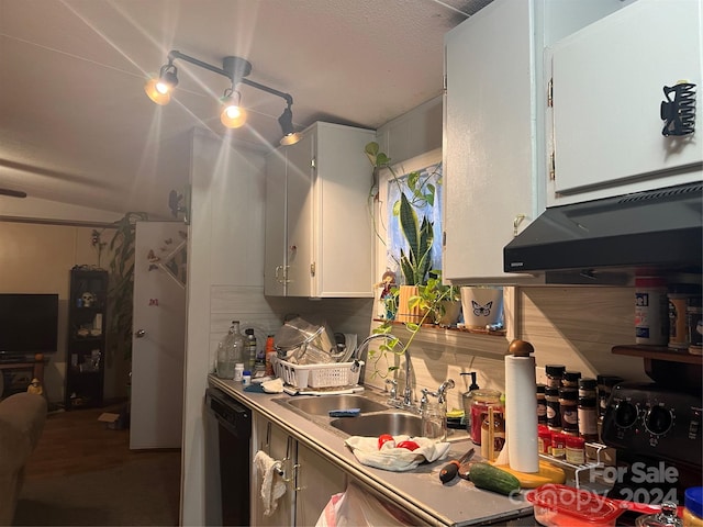 kitchen featuring white cabinets, tasteful backsplash, dishwasher, and sink