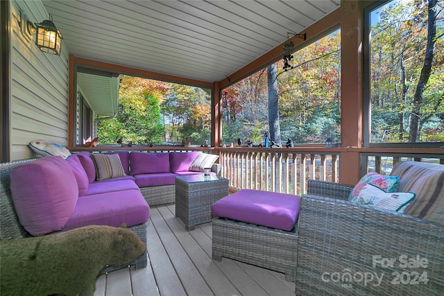 wooden deck with outdoor lounge area