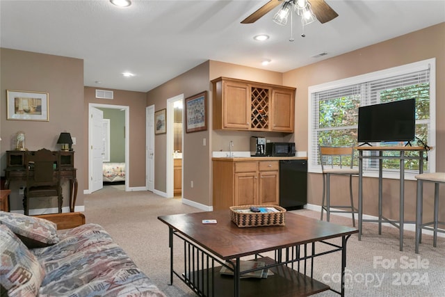 living room with light carpet and ceiling fan