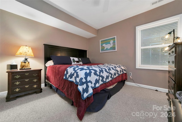 bedroom with ceiling fan and carpet