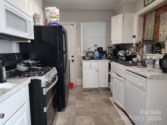 kitchen featuring sink, white cabinetry, crown molding, and white appliances