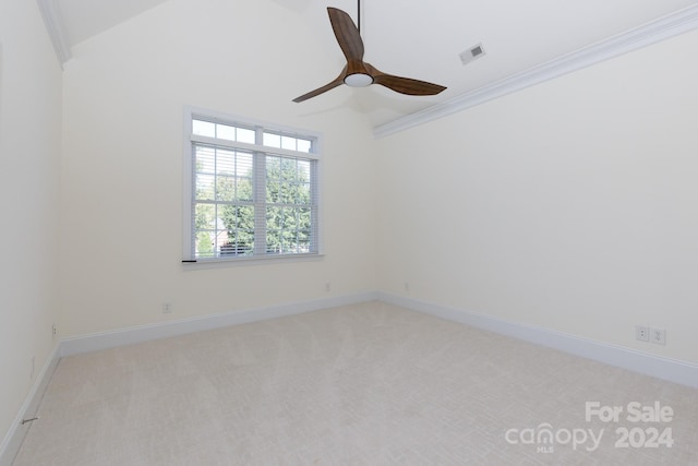 unfurnished room featuring light carpet, crown molding, and ceiling fan