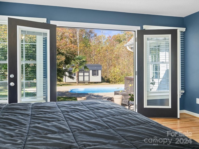 bedroom featuring hardwood / wood-style flooring