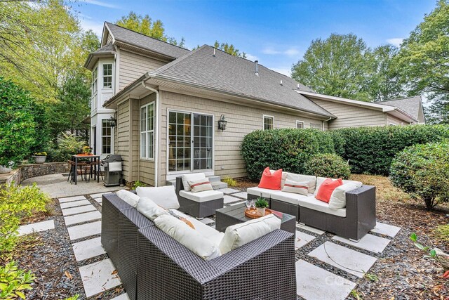 view of patio featuring outdoor lounge area and grilling area