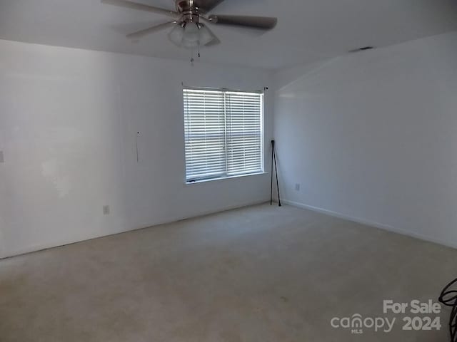 141 Rock Ridge Ln, Mount Holly, NC 28120 - carpeted spare room with a ceiling fan