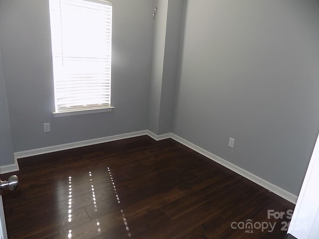 141 Rock Ridge Ln, Mount Holly, NC 28120 - unfurnished room featuring dark wood-type flooring and baseboards