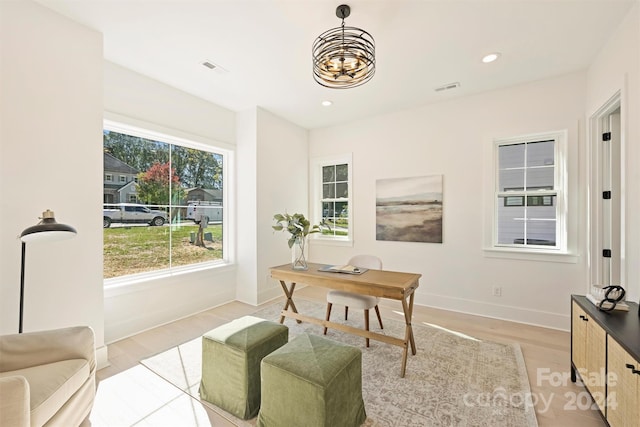 office space featuring light hardwood / wood-style floors