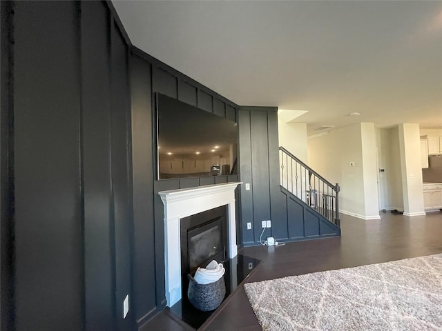 living room featuring dark wood-type flooring