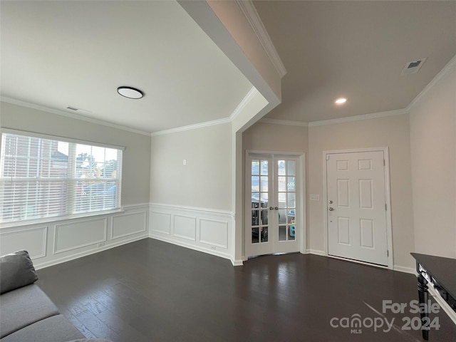 entryway featuring french doors, ornamental molding, and dark hardwood / wood-style floors