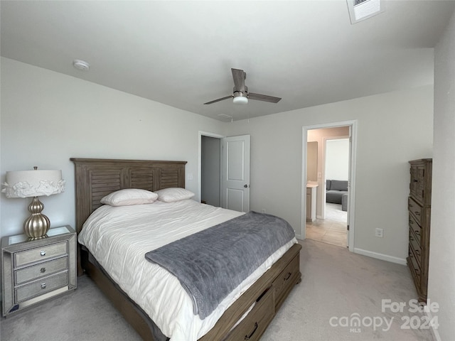 bedroom with light colored carpet and ceiling fan