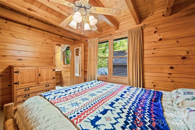 bedroom featuring wood walls, wood ceiling, a ceiling fan, and beam ceiling