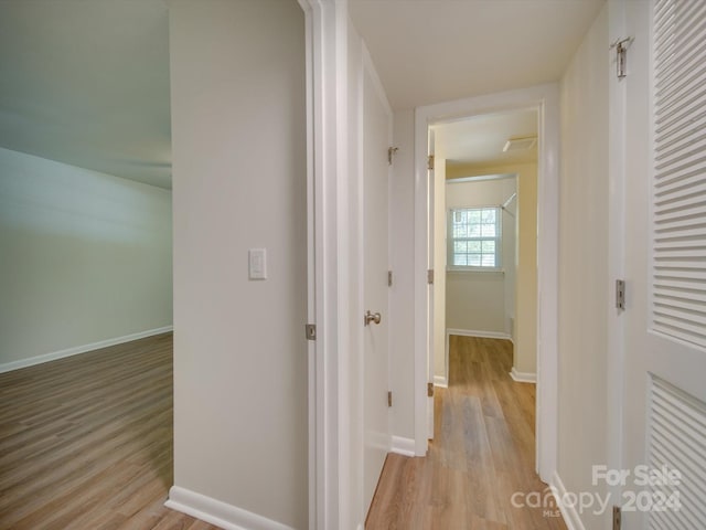 4605 Coronado Dr Unit M, Charlotte, NC 28212 - corridor with baseboards and light wood-type flooring