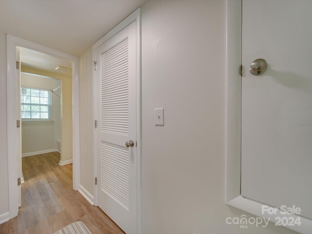 corridor featuring light wood-type flooring